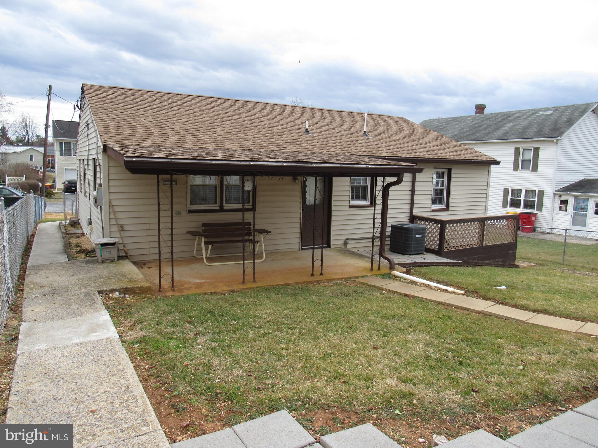 110 West 6th Avenue Ranson, WV 25438 - Photo 3 of 27 a view of a house with backyard and sitting area