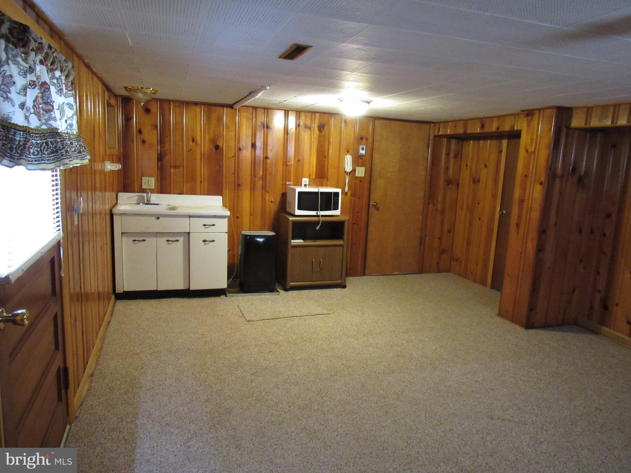110 West 6th Avenue Ranson, WV 25438 - Photo 23 of 27 a view of a kitchen with appliances and cabinets