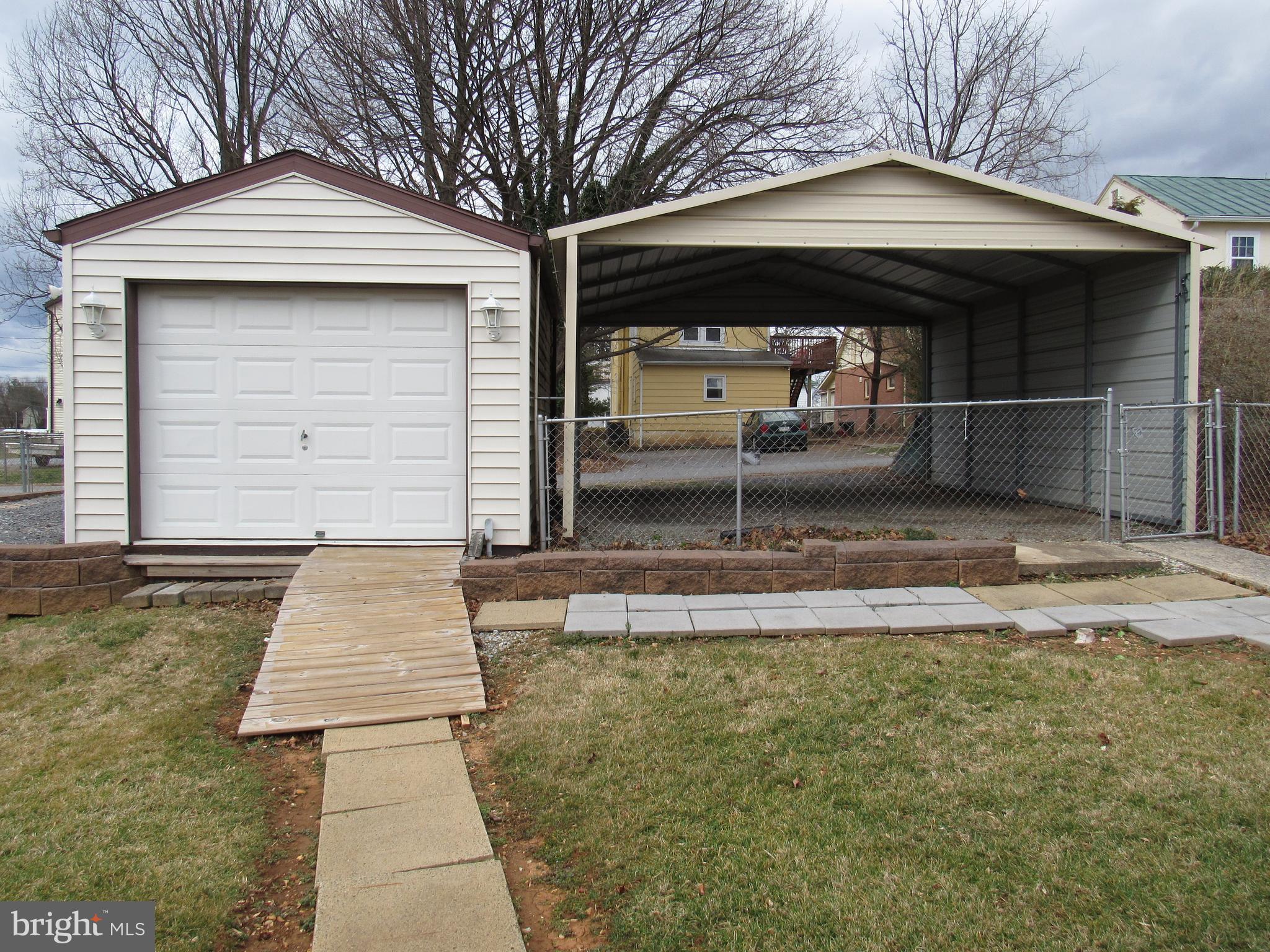 110 West 6th Avenue Ranson, WV 25438 - Photo 6 of 27 a view of a car park front of a house