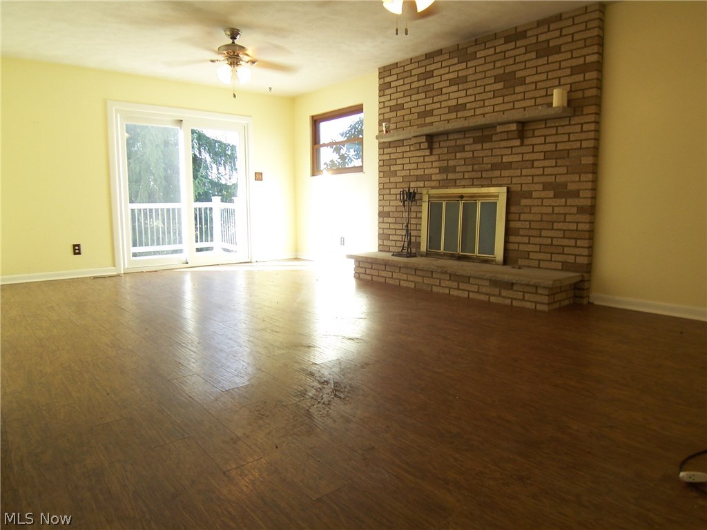 6723 Dupont Road Washington, WV 26181 - Photo 12 of 28 21X13 Family Room w/ Wood Burning Fireplace