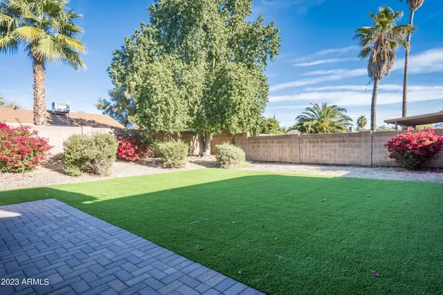 a view of yard with outdoor seating