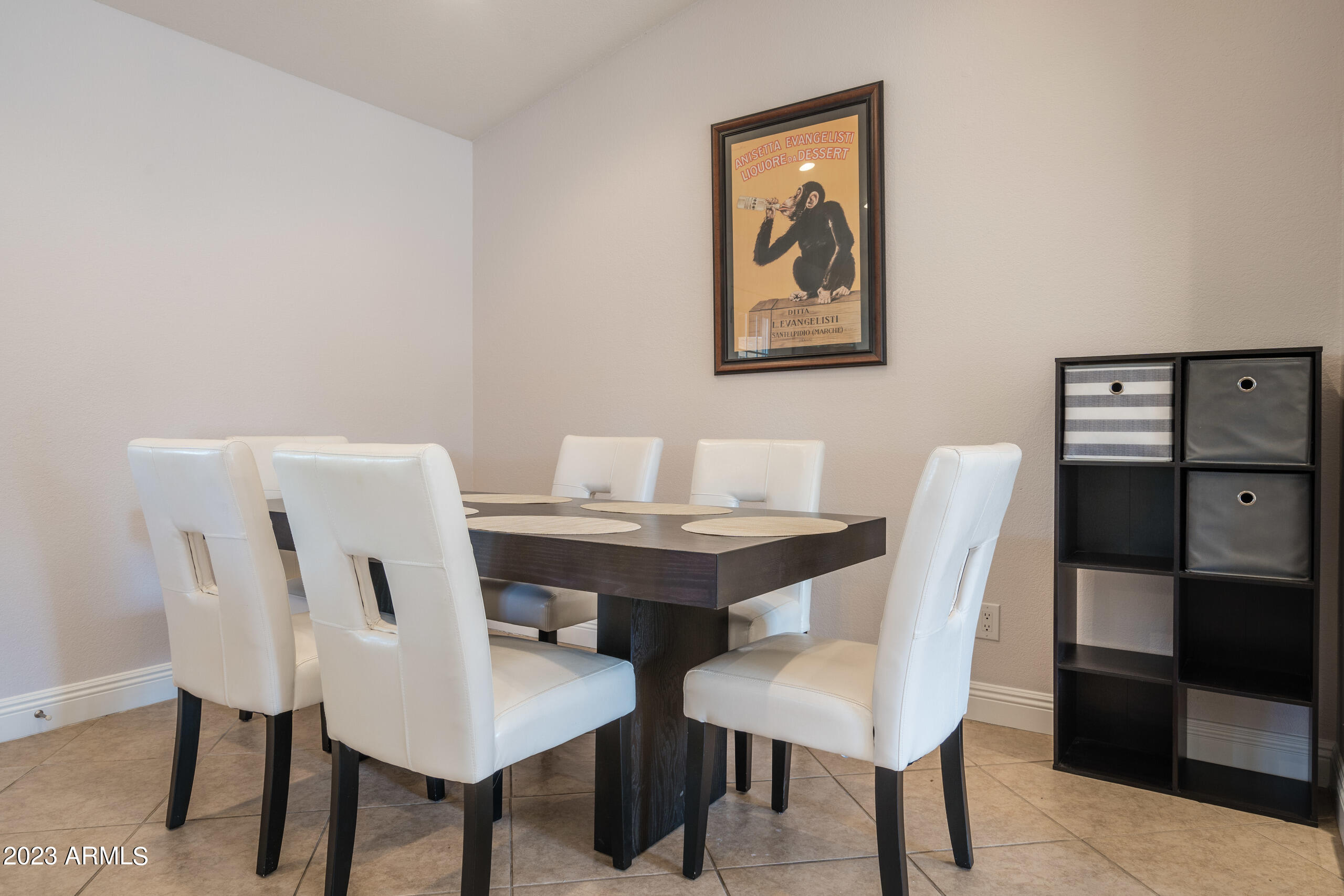 6444 East Sandra Terrace Scottsdale, AZ 85254 - Photo 6 of 22 a view of a dining room with furniture