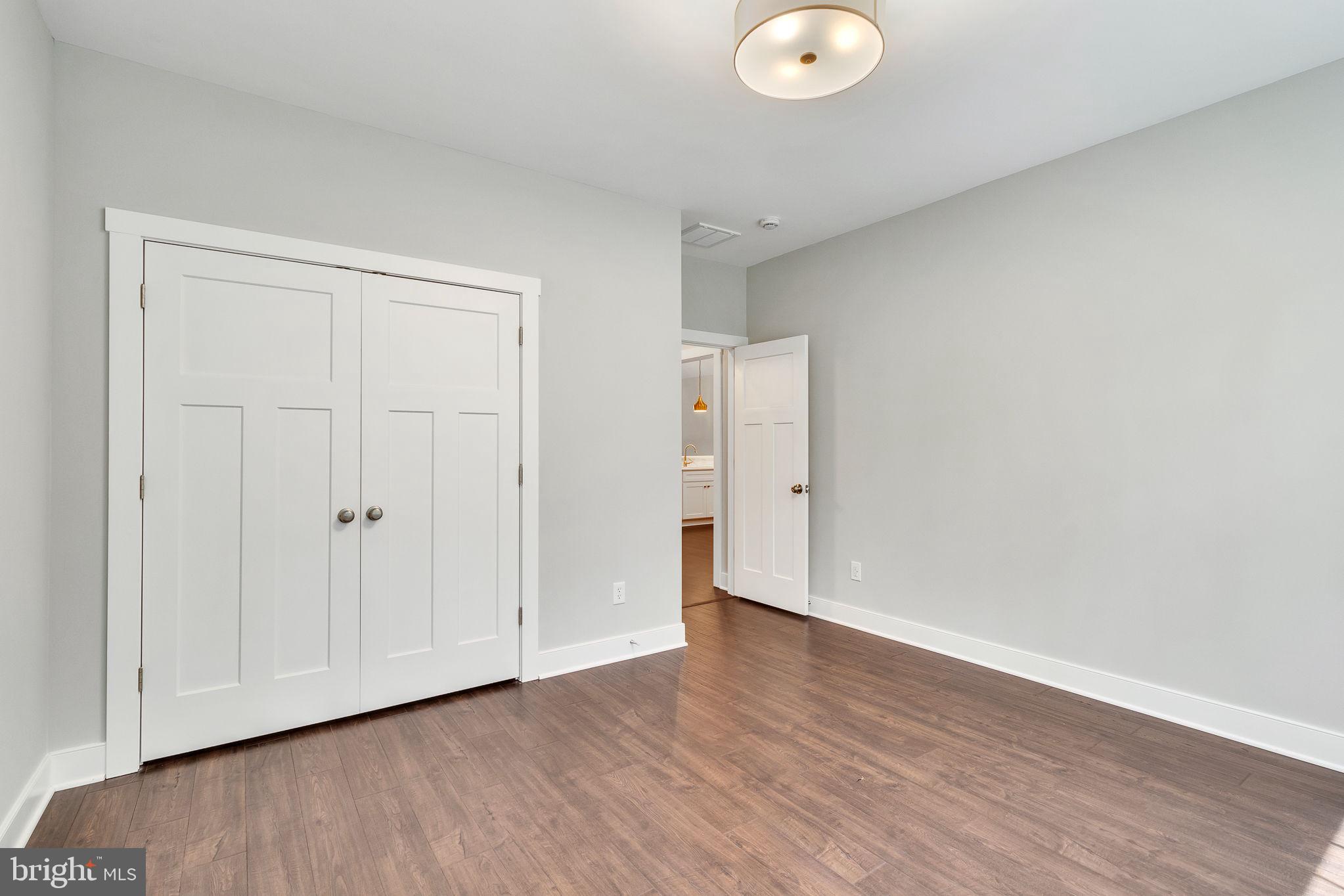 57 Waterman's Way Reedville, VA 22539 - Photo 6 of 43 Front bedroom, large closet, ceiling light