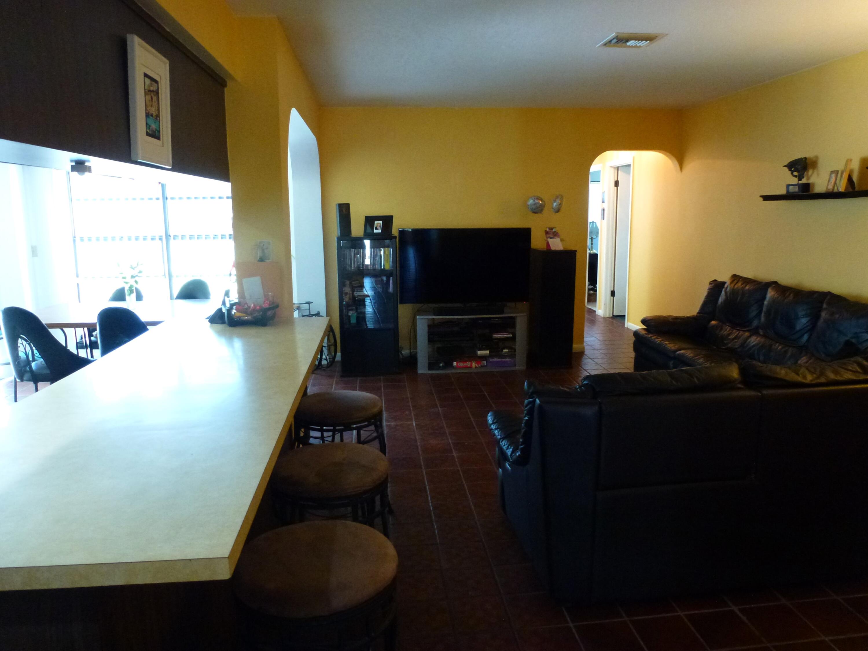1599 Southwest 2nd Street Boca Raton, FL 33486 - Photo 13 of 31 Great Room with Snack Bar