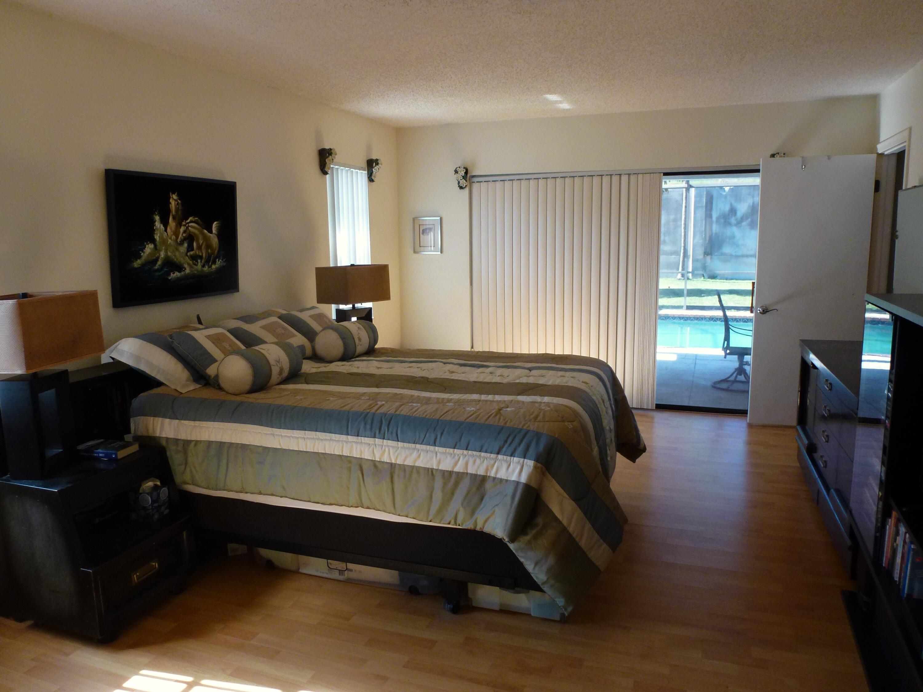 1599 Southwest 2nd Street Boca Raton, FL 33486 - Photo 16 of 31 Master Bedroom With Pool View