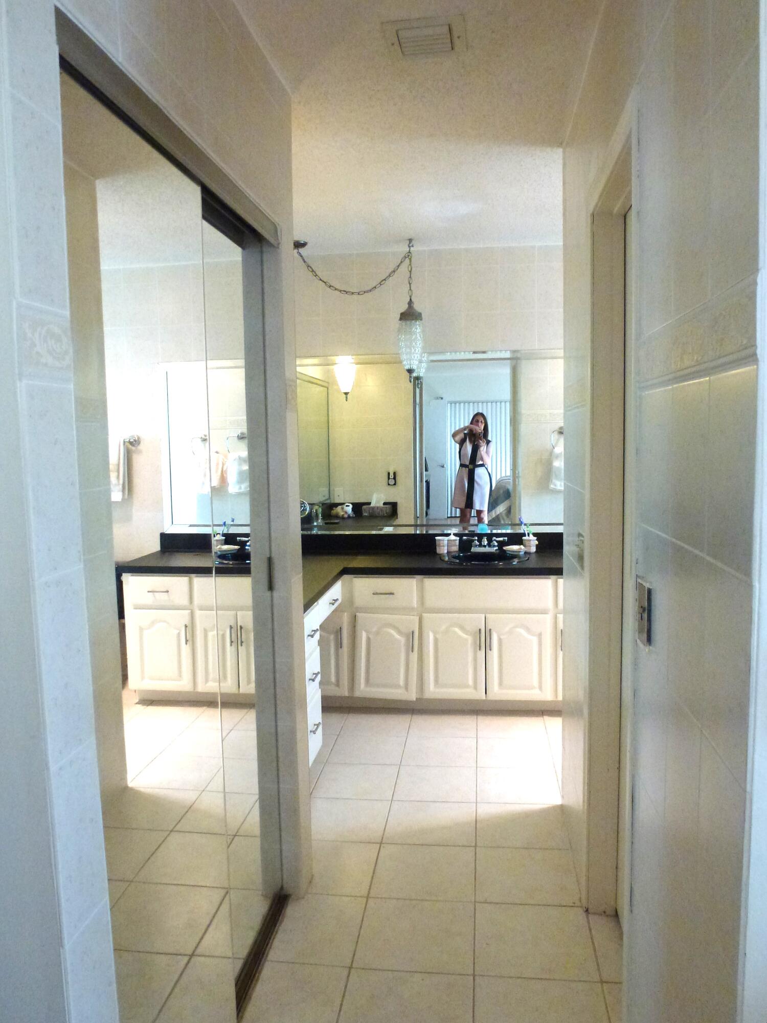 1599 Southwest 2nd Street Boca Raton, FL 33486 - Photo 19 of 31 Master Bathroom With His and Her Closets