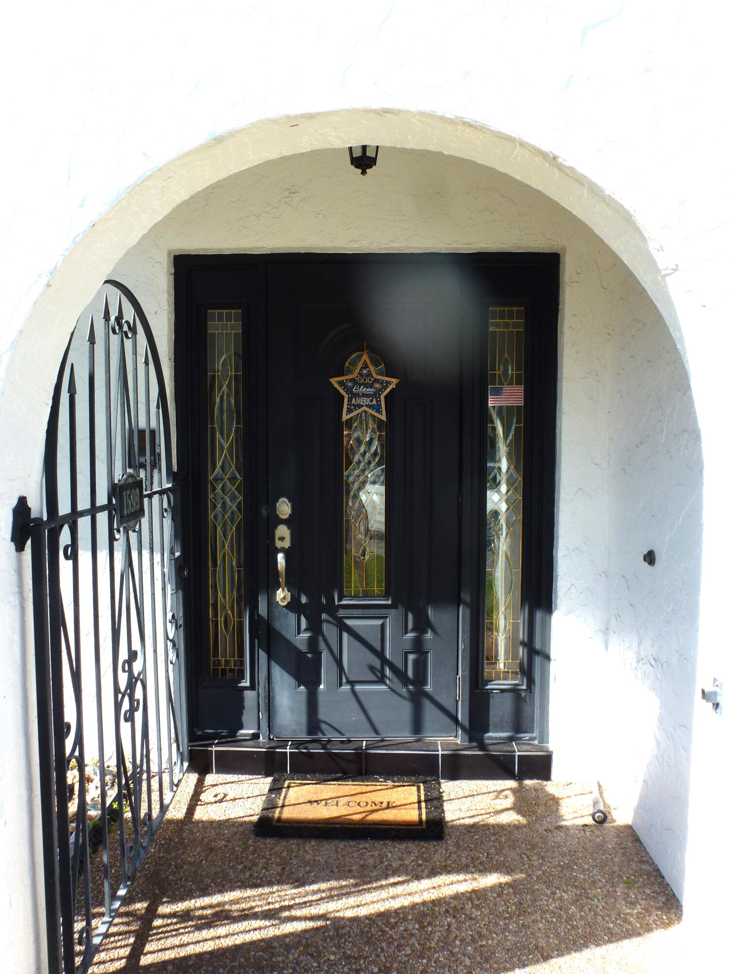1599 Southwest 2nd Street Boca Raton, FL 33486 - Photo 4 of 31 Arched Front Door Entrance