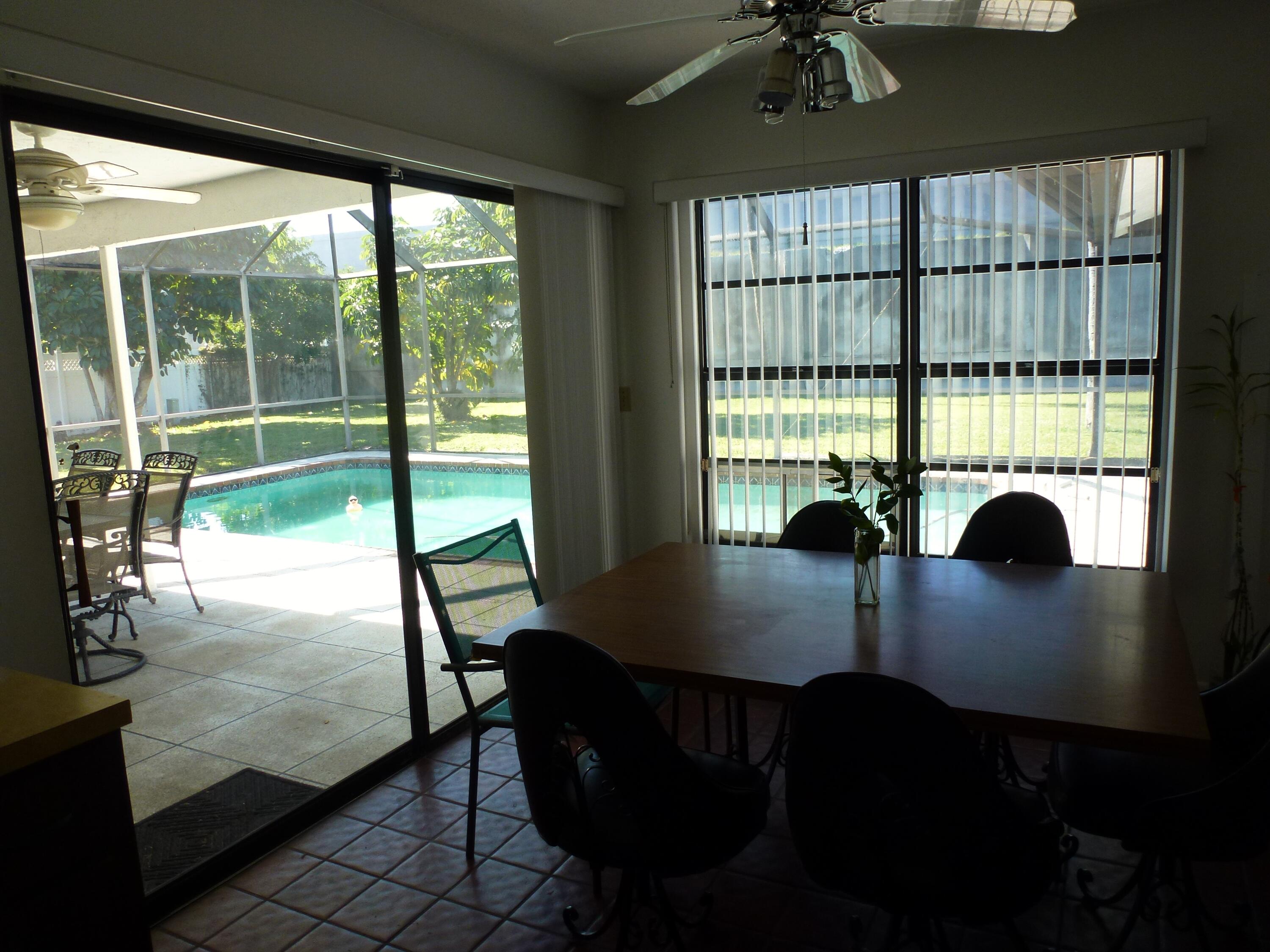 1599 Southwest 2nd Street Boca Raton, FL 33486 - Photo 10 of 31 Breakfast Area With Pool View