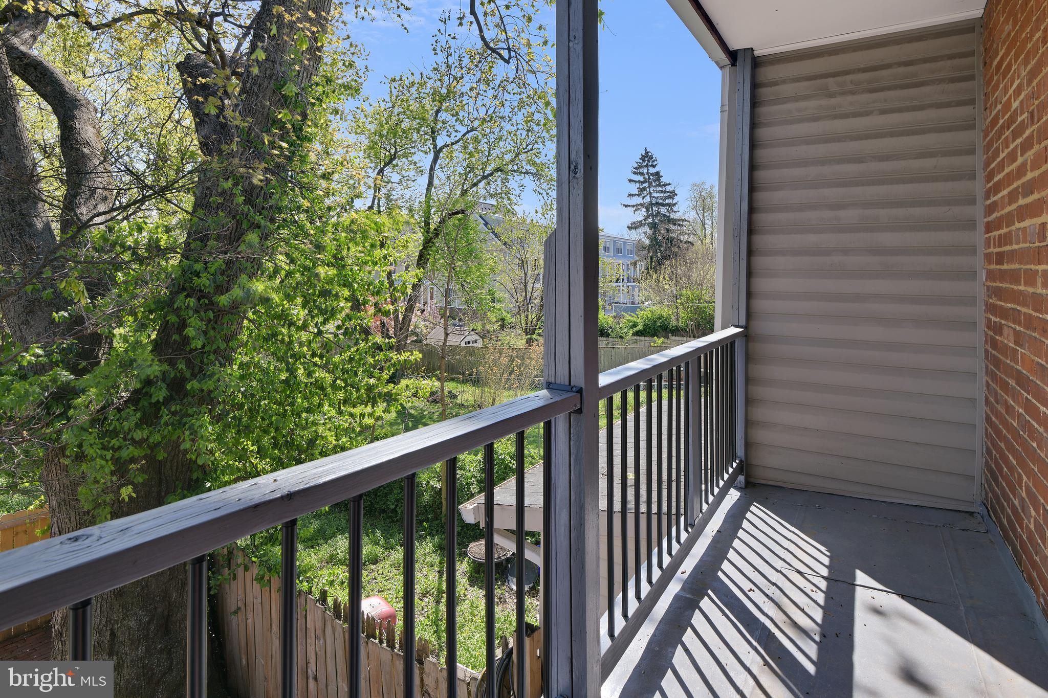 230 East 5th Street Frederick, MD 21701 - Photo 10 of 24 a view of a balcony with wooden floor
