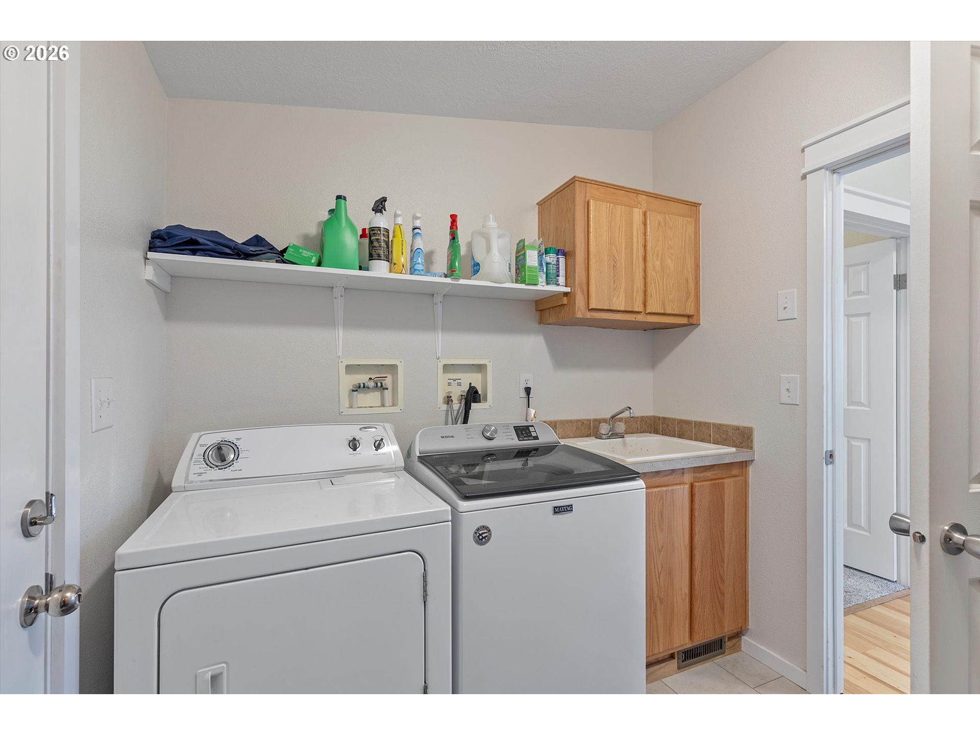 1206 Criteser Loop Toledo, OR 97391 - Photo 30 of 46 a utility room with dryer and washer