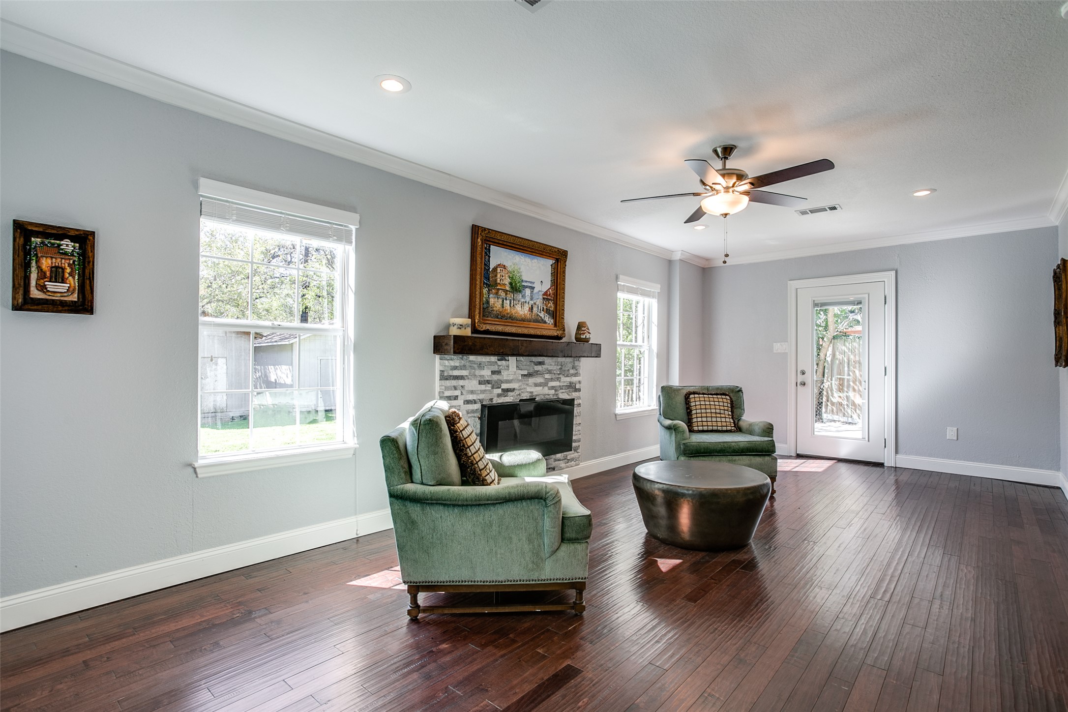 332 Tuttle Road Terrell Hills, TX 78209 - Photo 14 of 25 a living room with furniture a fireplace and a window