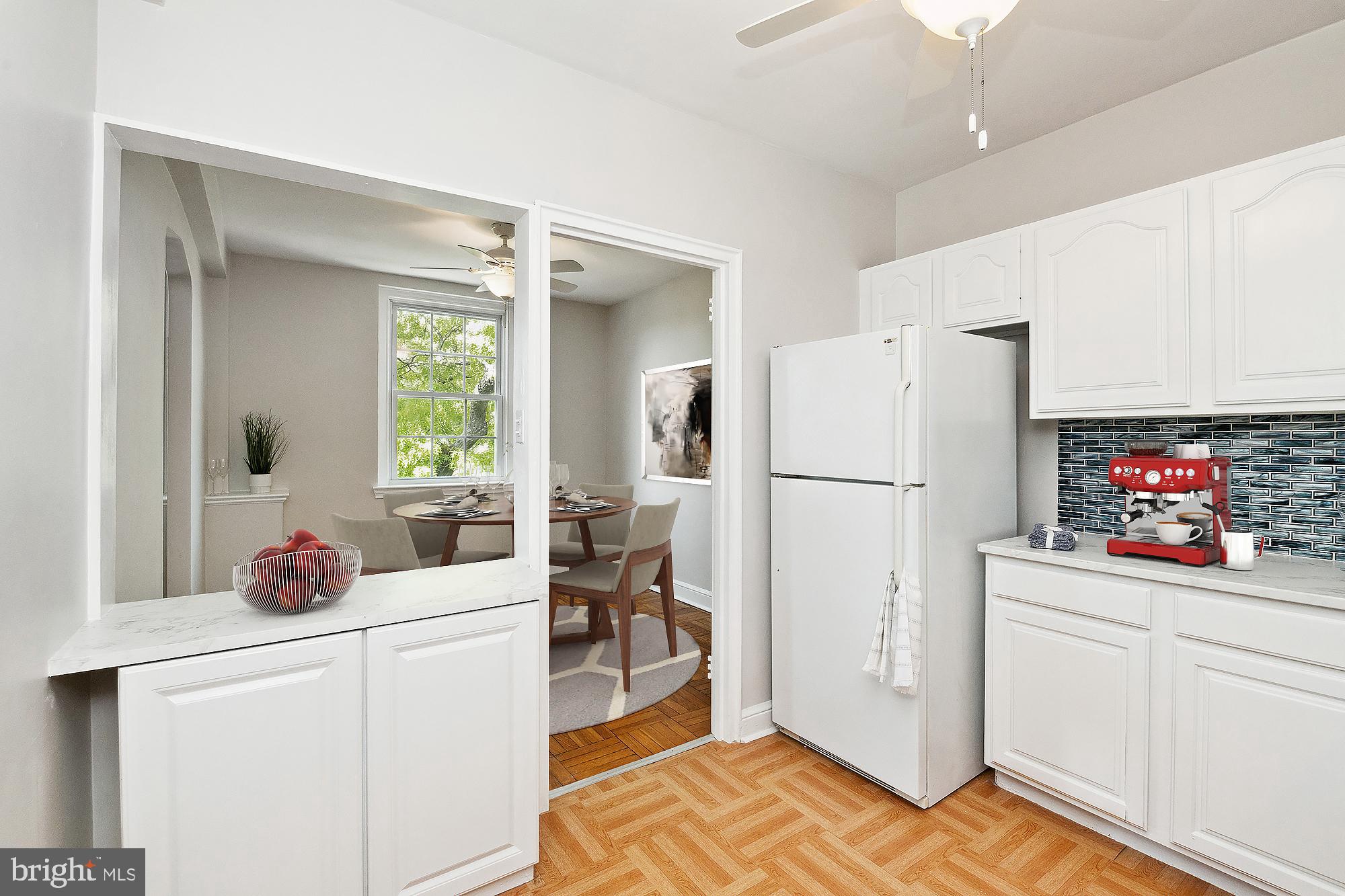 221 Ridgemede Road, Unit 505 Baltimore, MD 21210 - Photo 8 of 36 Open Kitchen to Dining room