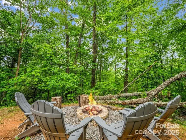 a view of backyard with seating space