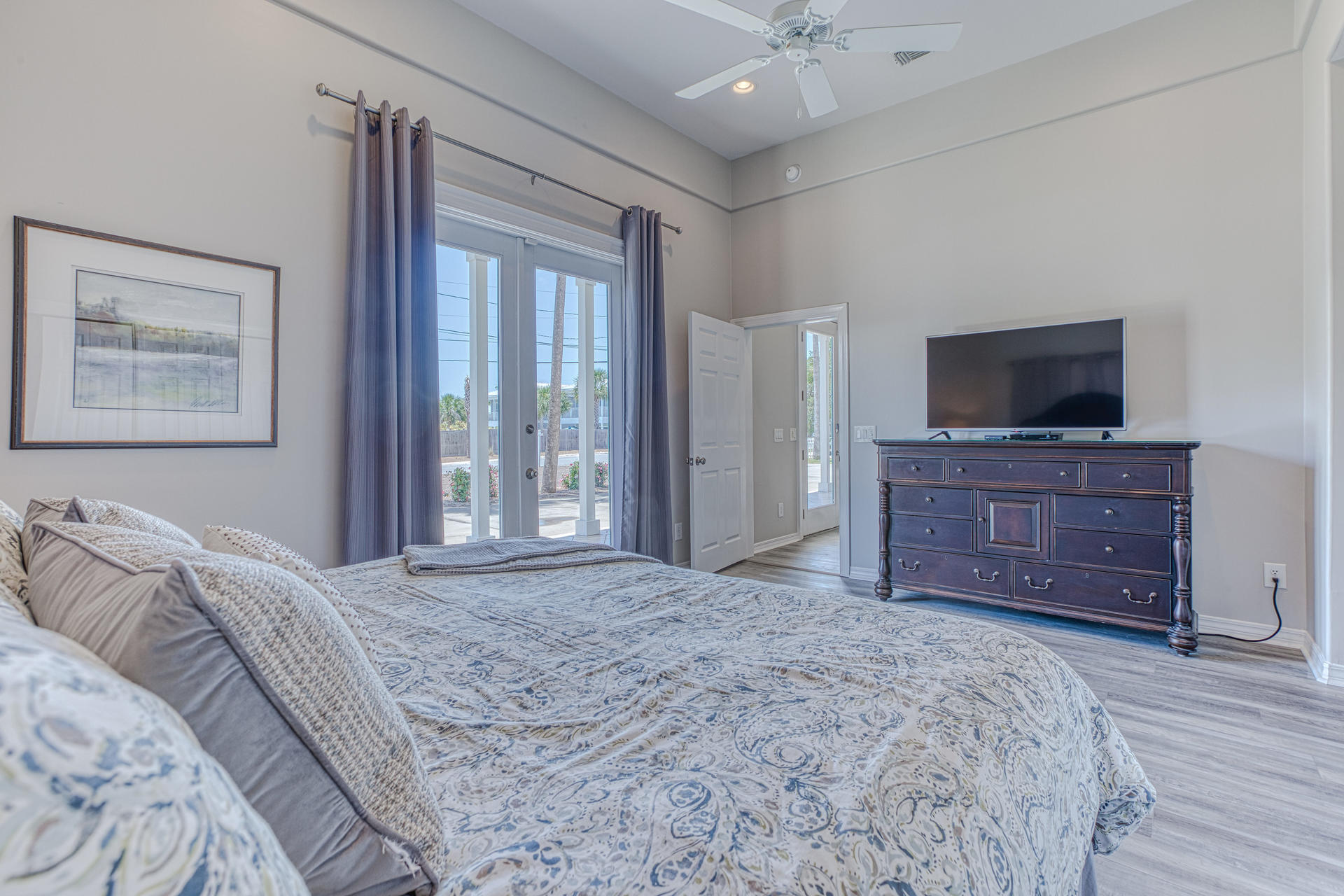 4583 Luke Avenue Destin, FL 32541 - Photo 16 of 86 a bedroom with a bed and a flat screen tv on dresser