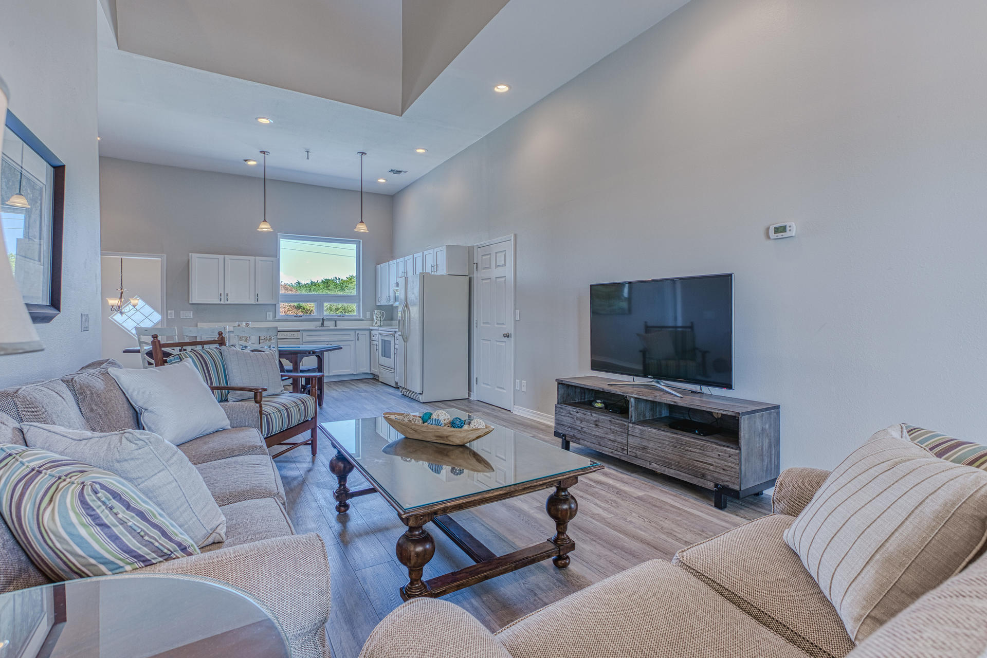 4583 Luke Avenue Destin, FL 32541 - Photo 35 of 86 a living room with furniture and a flat screen tv