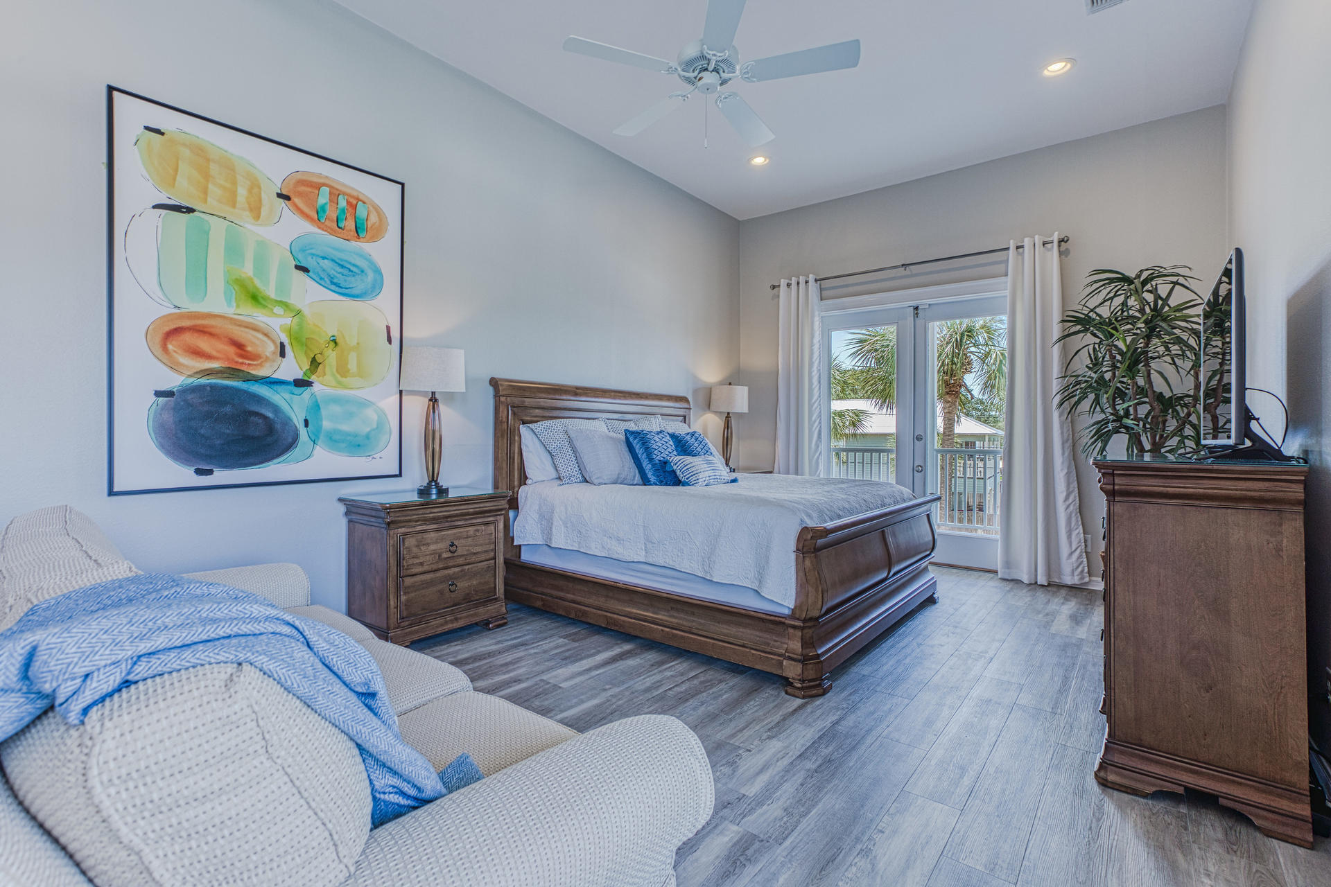 4583 Luke Avenue Destin, FL 32541 - Photo 37 of 86 a bedroom with a bed and a painting on the wall