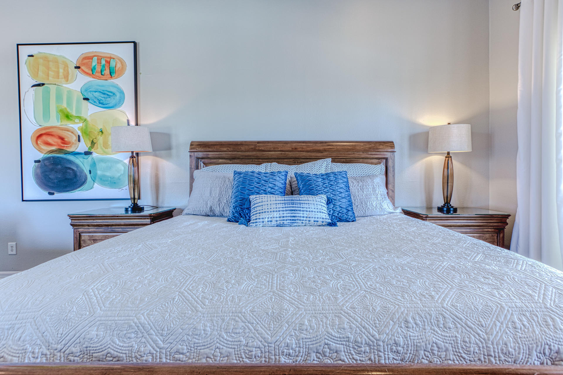 4583 Luke Avenue Destin, FL 32541 - Photo 38 of 86 a bedroom with a bed and painting on the wall