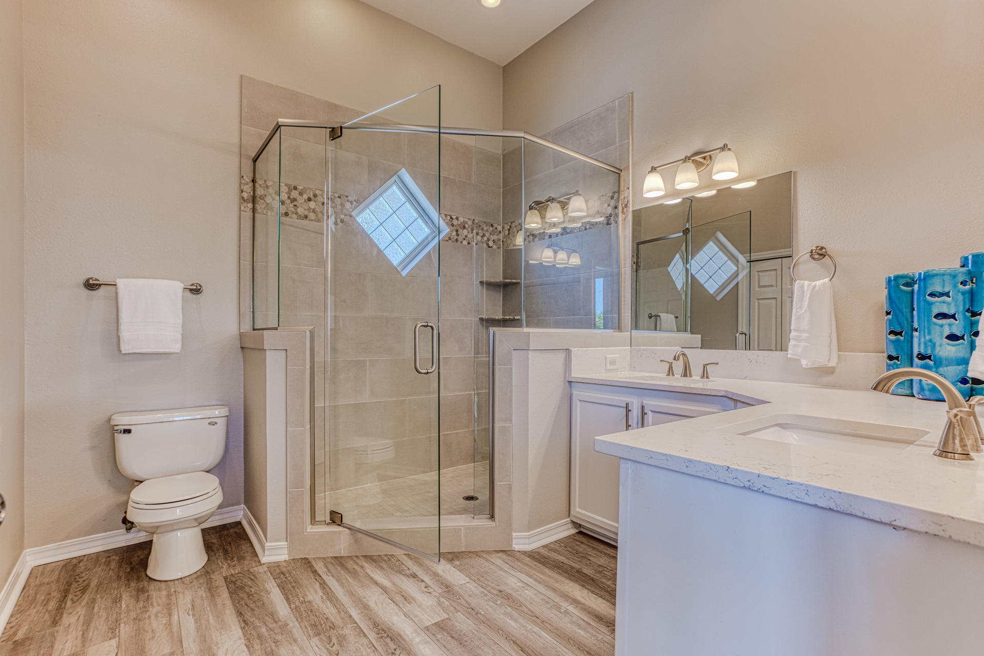 4583 Luke Avenue Destin, FL 32541 - Photo 40 of 86 a bathroom with a sink toilet and shower