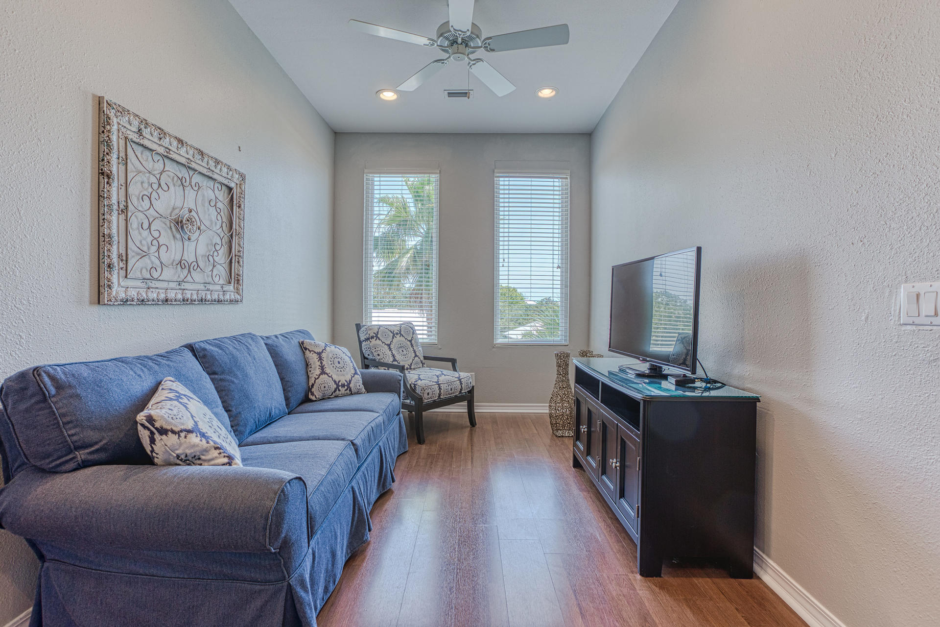 4583 Luke Avenue Destin, FL 32541 - Photo 48 of 86 a living room with furniture and a flat screen tv