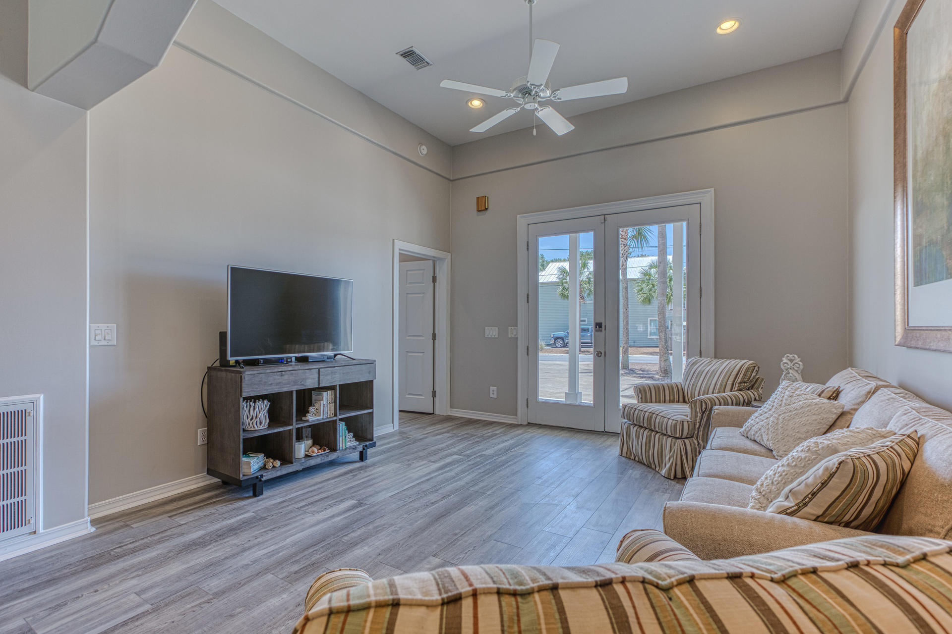 4583 Luke Avenue Destin, FL 32541 - Photo 8 of 86 a living room with furniture and a flat screen tv