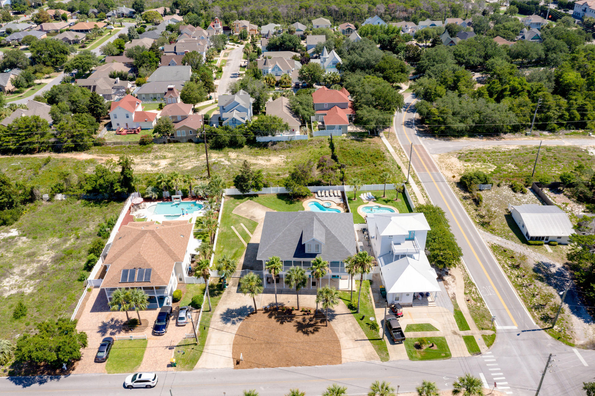 4583 Luke Avenue Destin, FL 32541 - Photo 82 of 86 an aerial view of residential houses with outdoor space and swimming pool