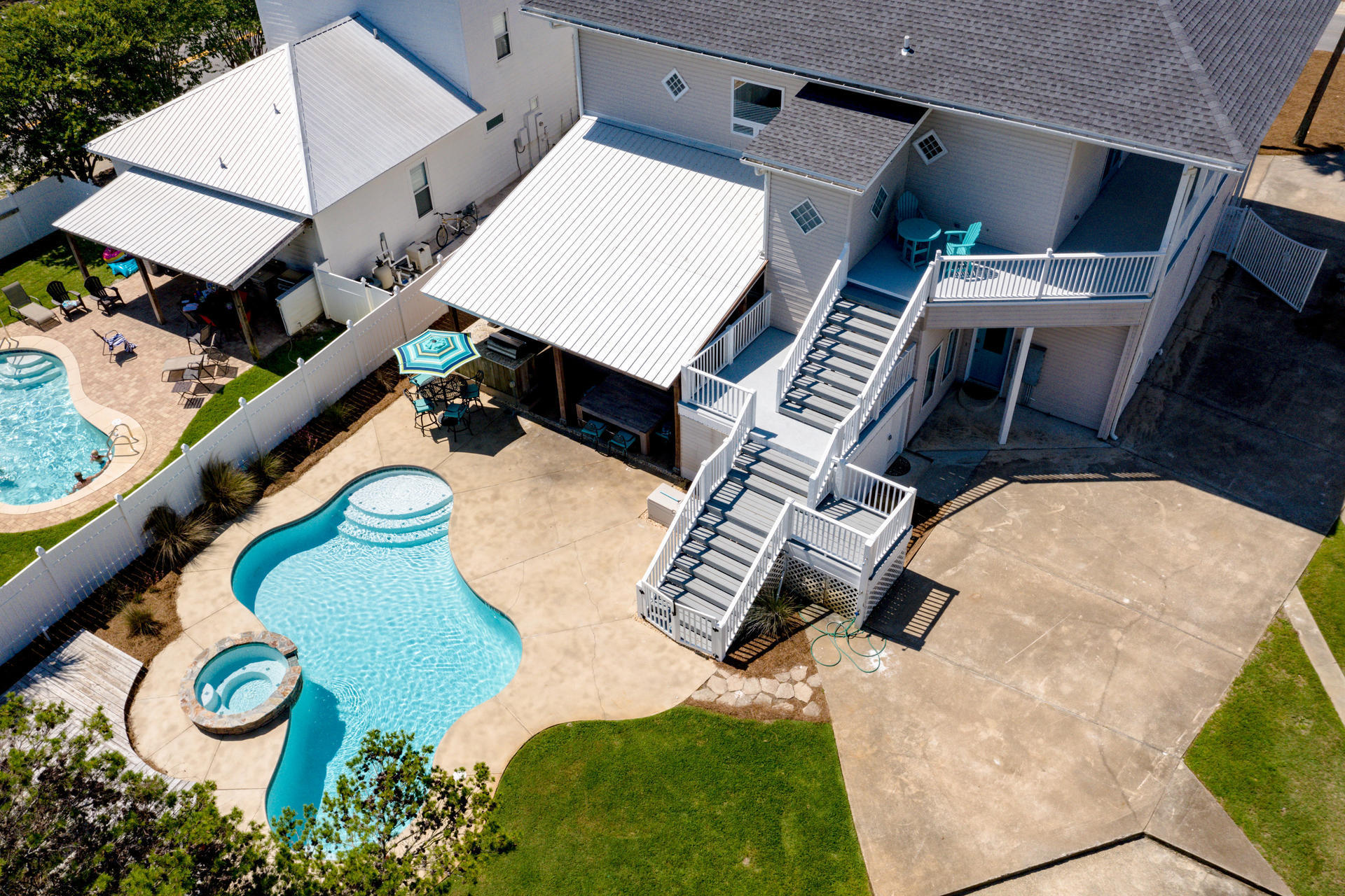 4583 Luke Avenue Destin, FL 32541 - Photo 85 of 86 an aerial view of a house with a swimming pool