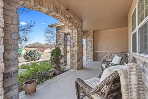 a bed room with a bed and a potted plant