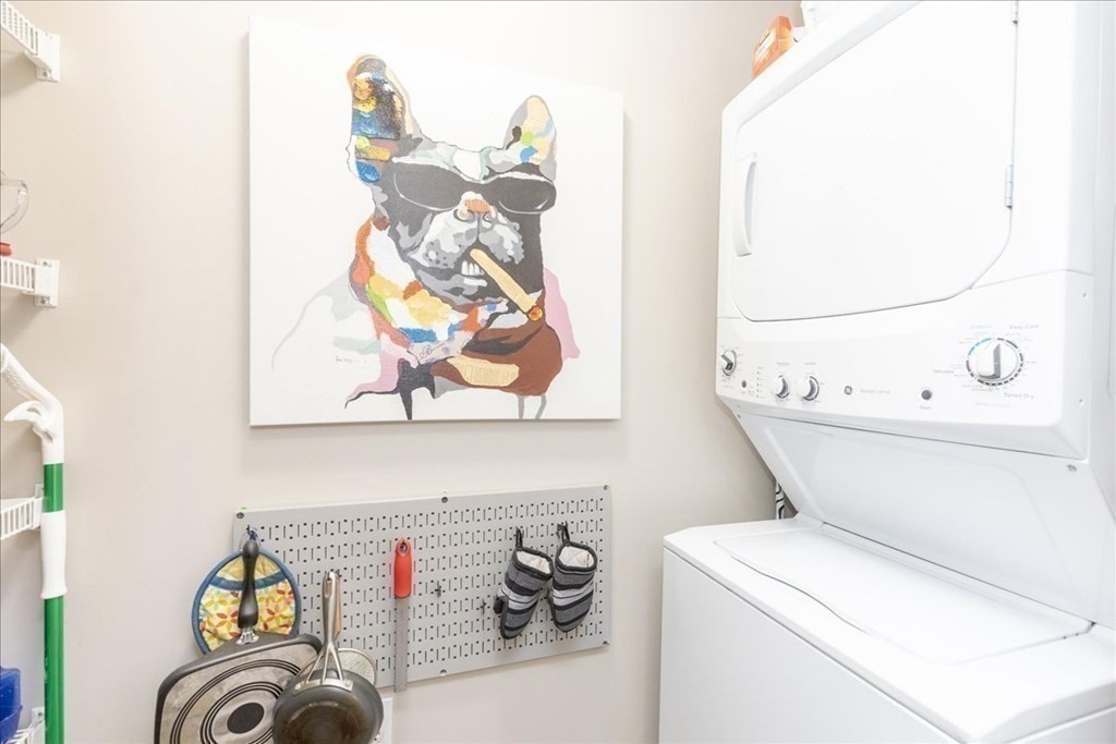 38 Village Road, Unit 312 Middleton, MA 01949 - Photo 11 of 42 a utility room with dryer and washer
