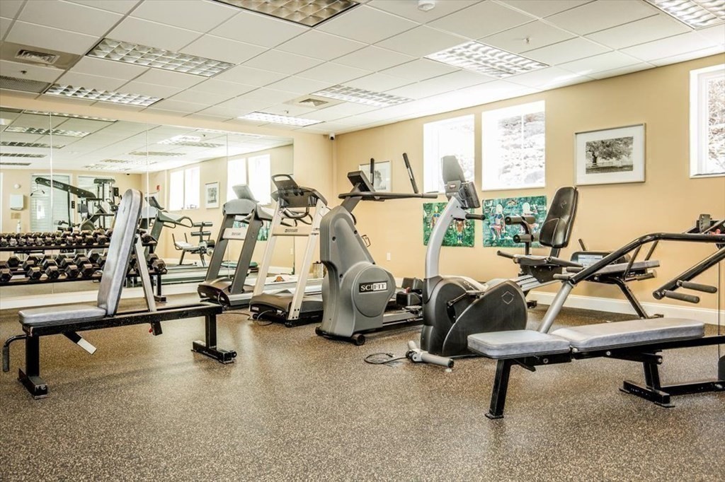 38 Village Road, Unit 312 Middleton, MA 01949 - Photo 38 of 42 a view of a room with gym equipment