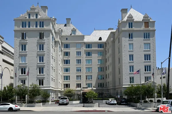 a front view of a building with street view