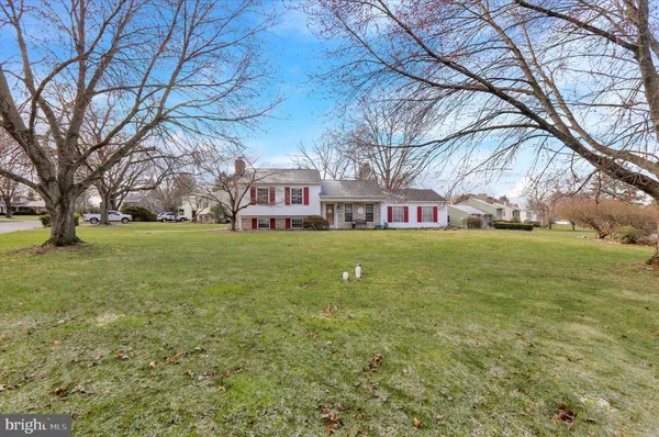 a view of a building with a big yard