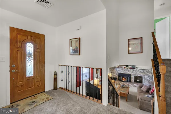 a view of a livingroom with a furniture and a flat screen tv