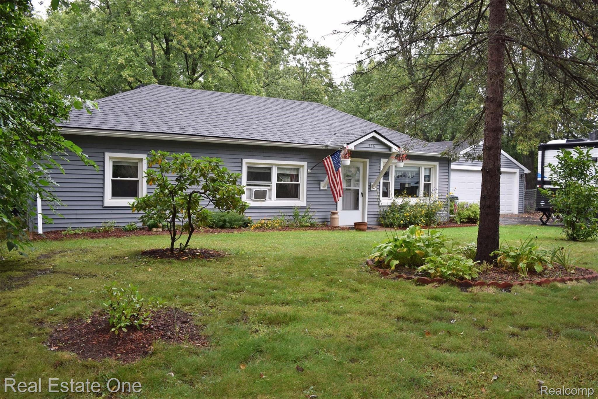 516 Woodruff Lake Road Highland, MI 48357 - Photo 2 of 34 front.jpg