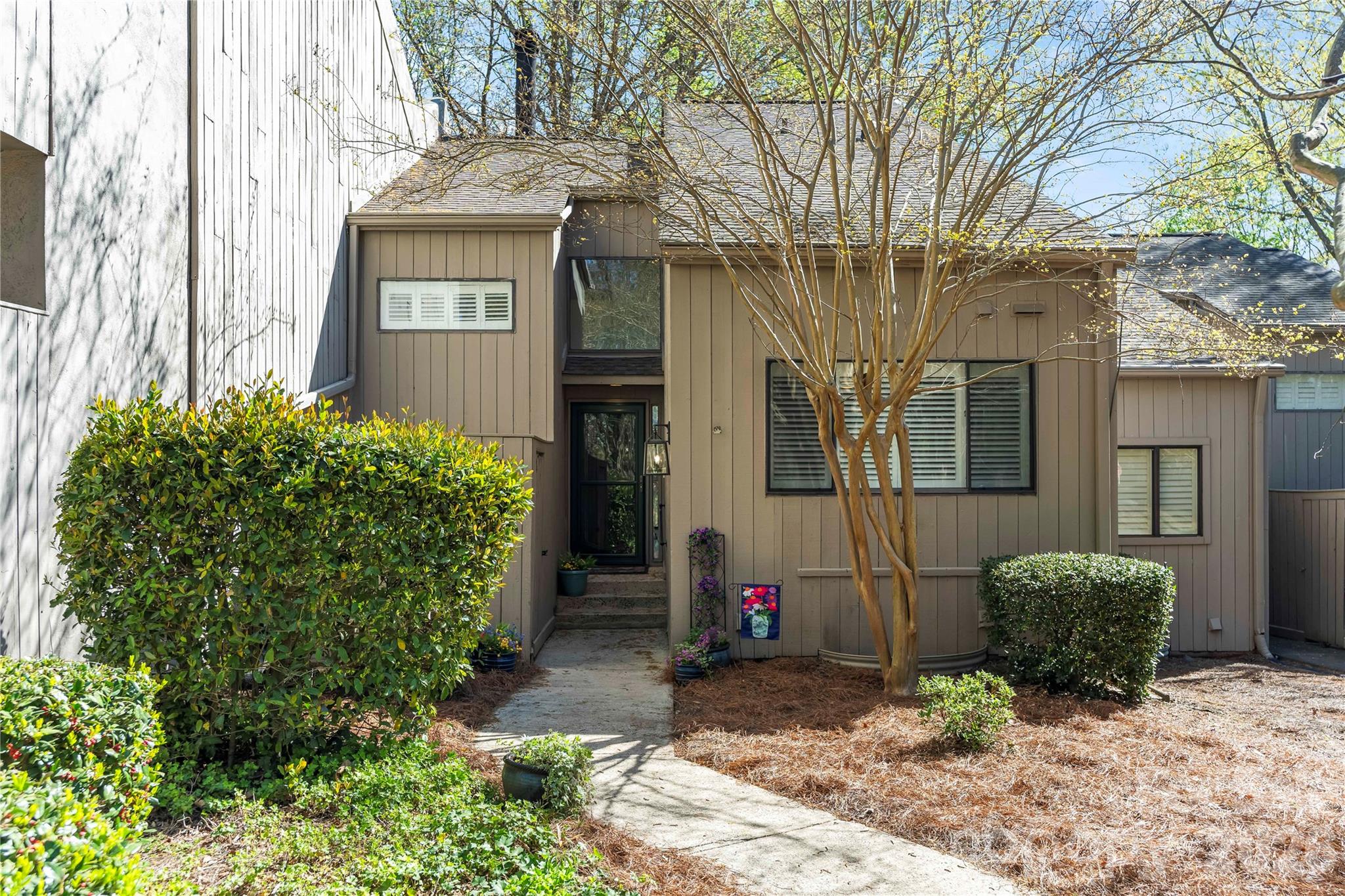133 Pine Grove Circle Clover, SC 29710 - Photo 1 of 48 a front view of a house with garden