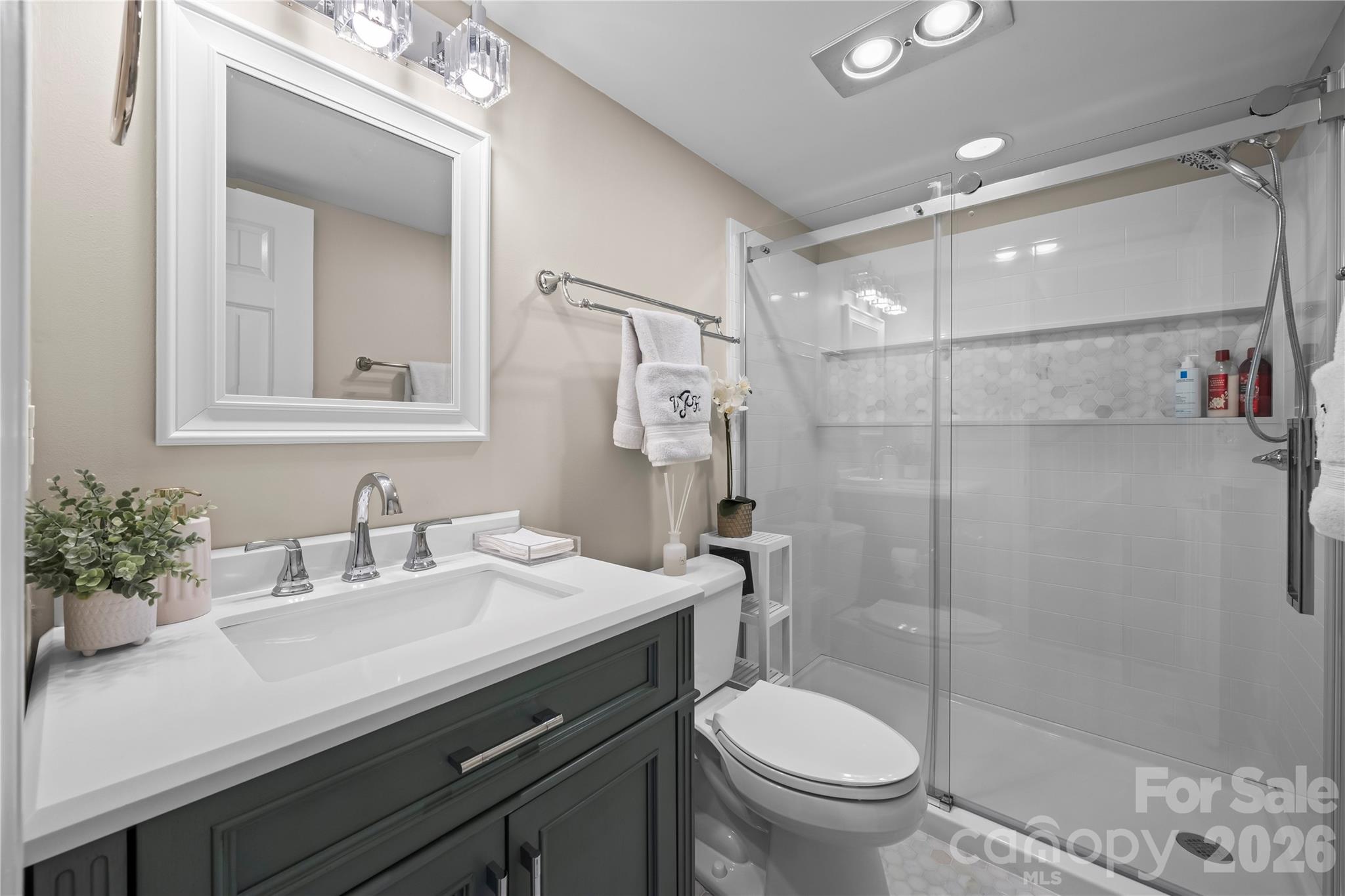 133 Pine Grove Circle Clover, SC 29710 - Photo 15 of 48 a bathroom with a sink toilet and shower
