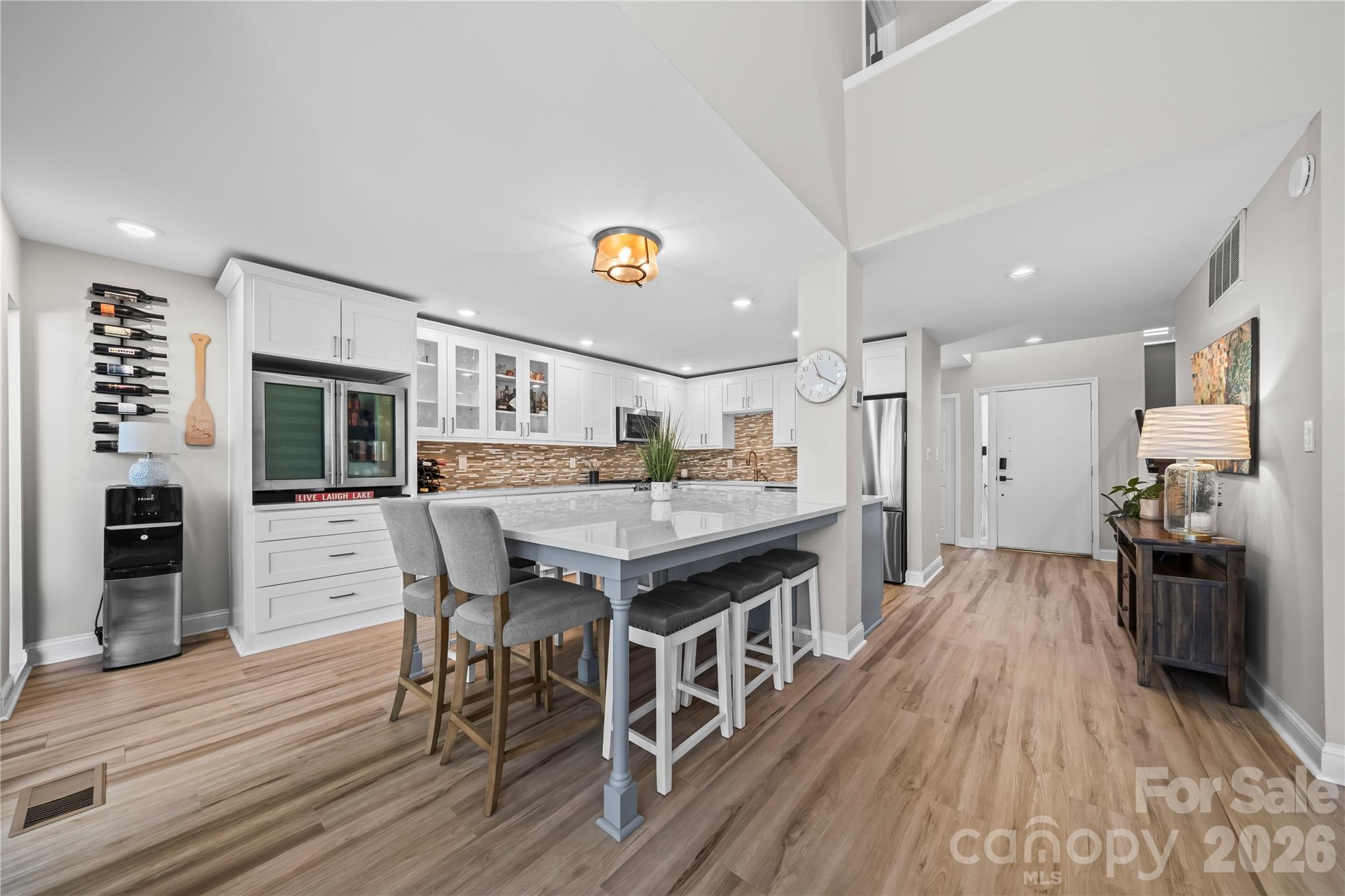 133 Pine Grove Circle Clover, SC 29710 - Photo 25 of 48 a kitchen with stainless steel appliances granite countertop a dining table chairs and wooden floor