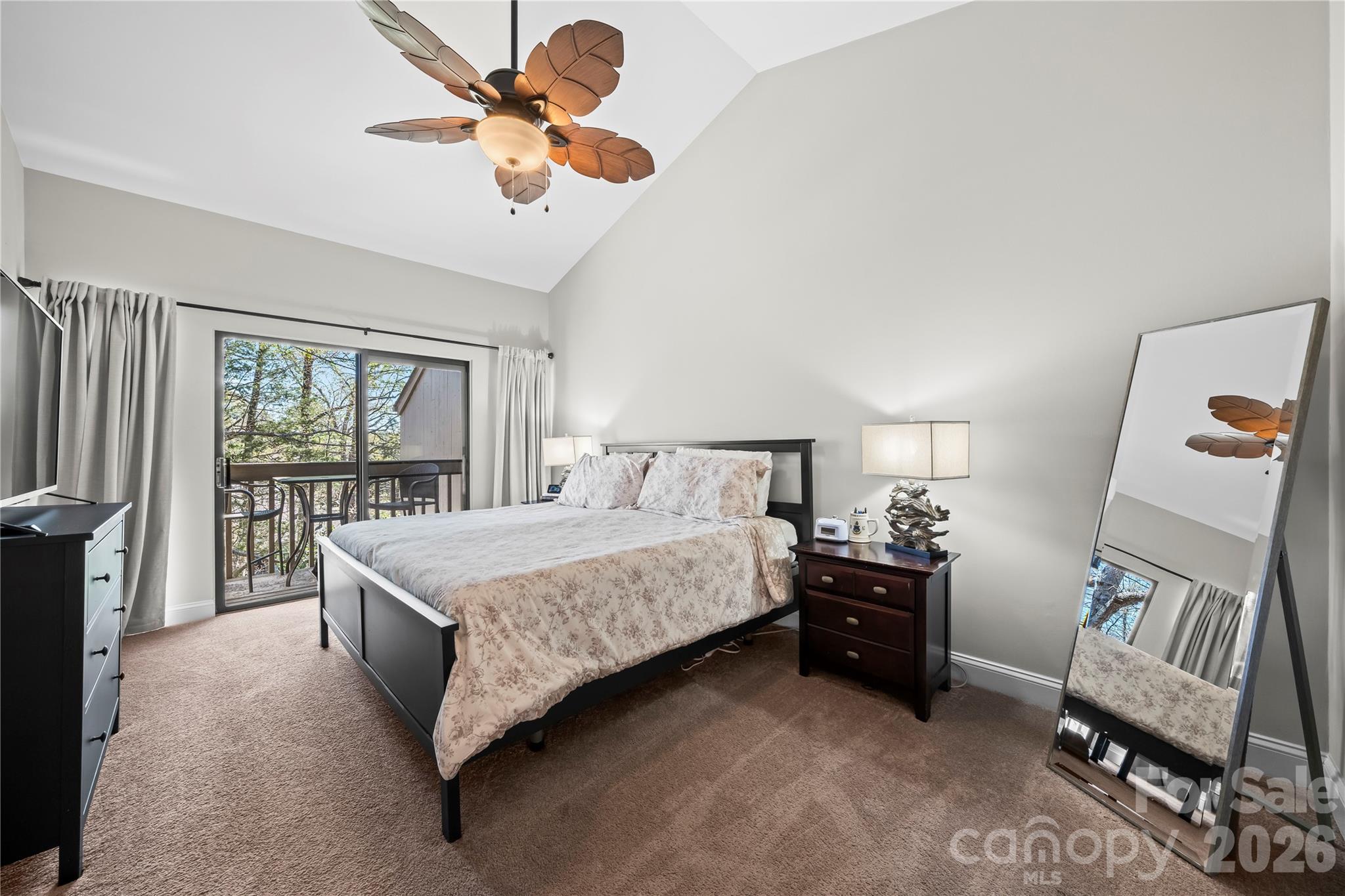 133 Pine Grove Circle Clover, SC 29710 - Photo 32 of 48 a bedroom with a bed and a chandelier