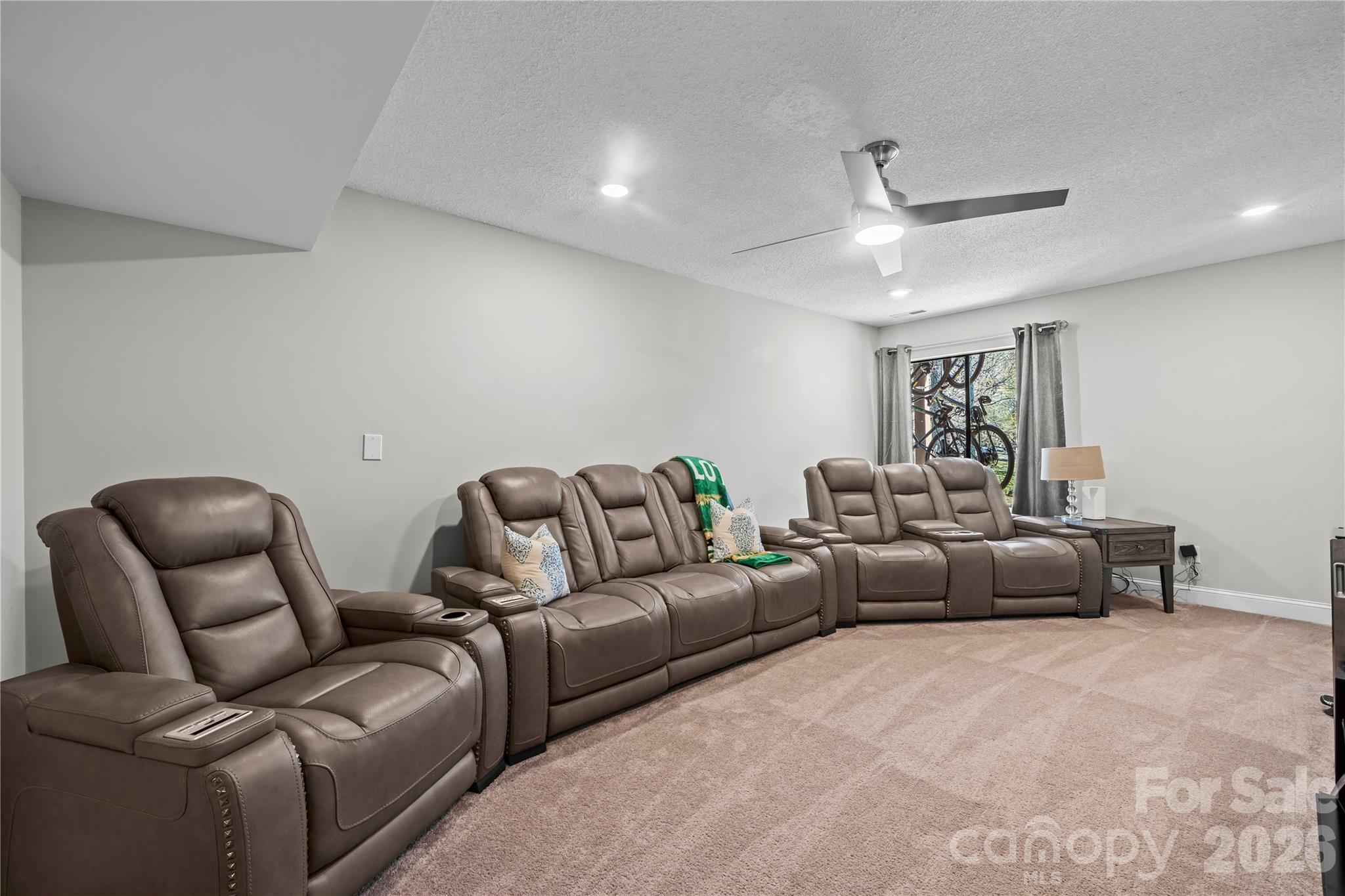 133 Pine Grove Circle Clover, SC 29710 - Photo 41 of 48 a living room with furniture and a ceiling fan