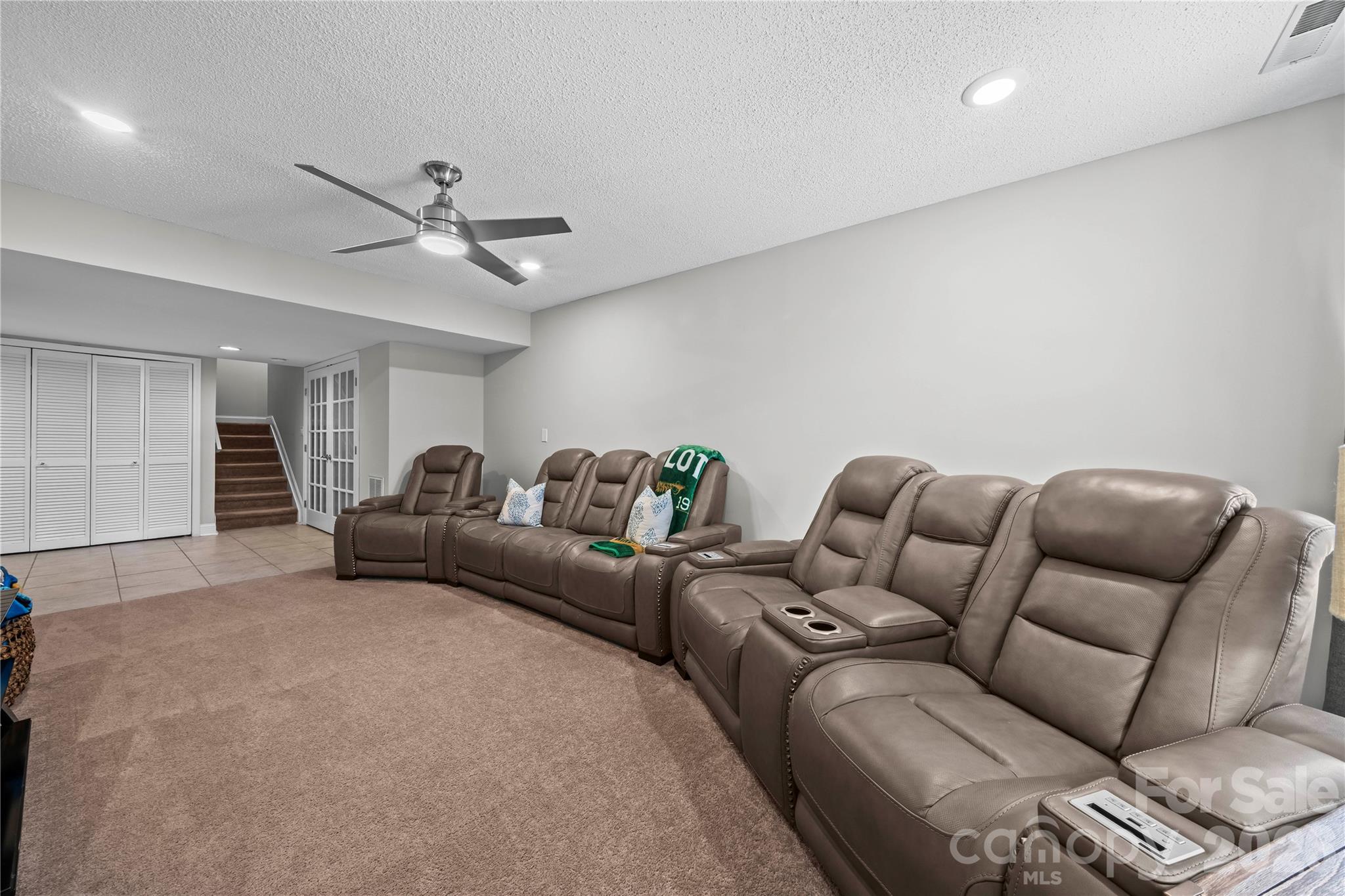 133 Pine Grove Circle Clover, SC 29710 - Photo 42 of 48 a living room with furniture a ceiling fan