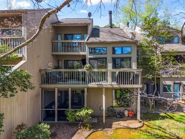 an aerial view of a house with swimming pool