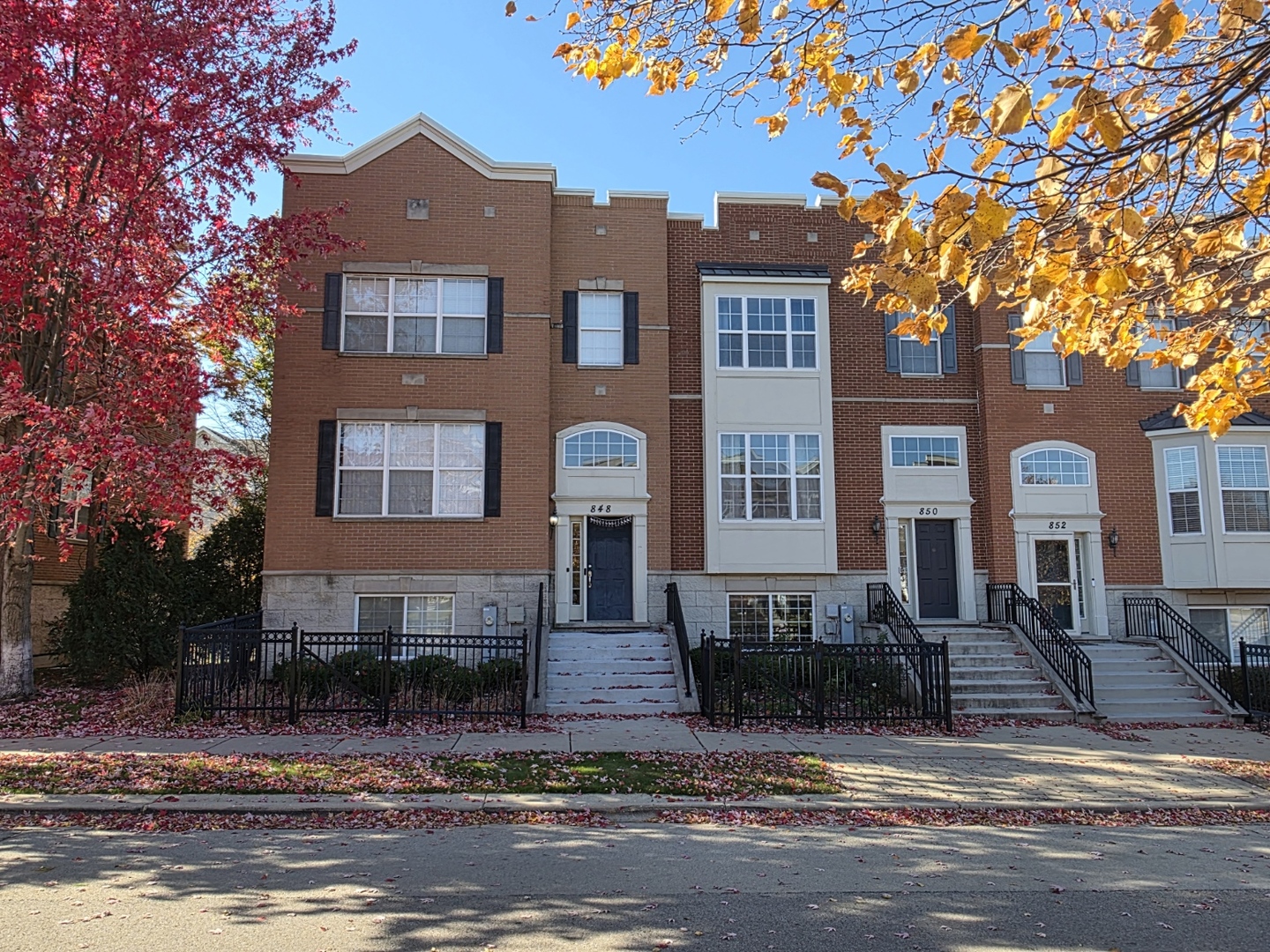 a view of a building with a yard