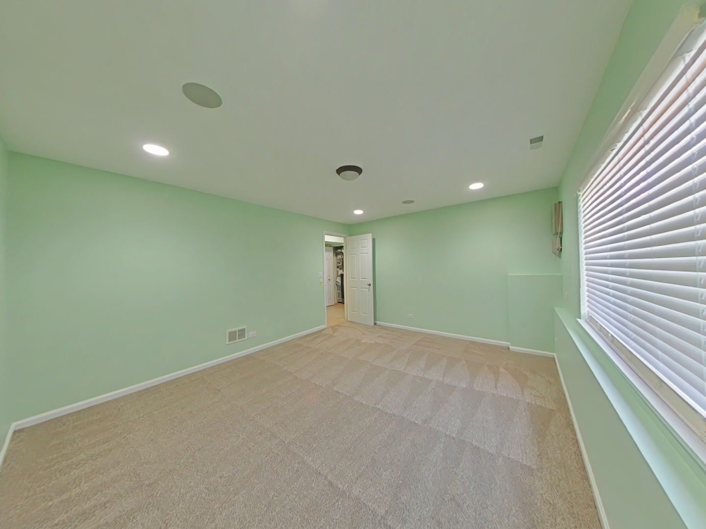 848 Station Boulevard Aurora, IL 60504 - Photo 11 of 12 a view of an empty room with a window