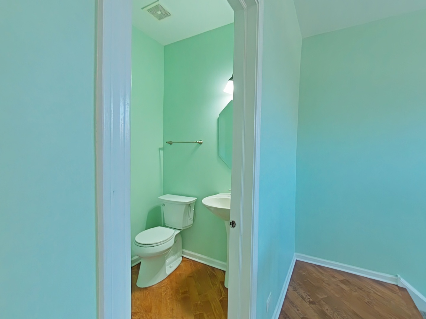 848 Station Boulevard Aurora, IL 60504 - Photo 4 of 12 a bathroom with a toilet and a sink