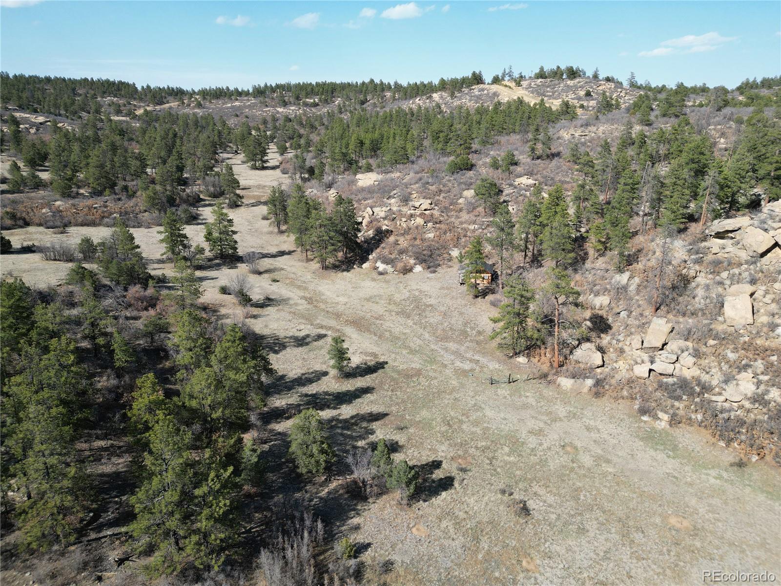 337 Rancho La Weston, CO 81091 - Photo 13 of 19 an aerial view of a house with a yard