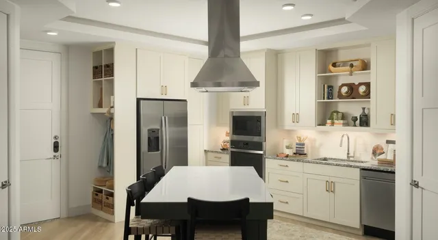 a kitchen with a dining table chairs refrigerator and cabinets