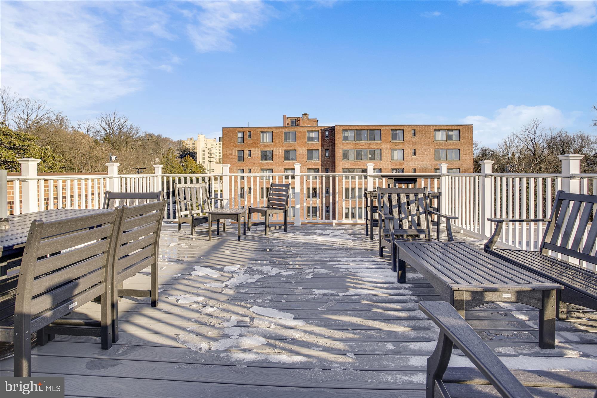 3900 Tunlaw Road Northwest, Unit 509 Washington, DC 20007 - Photo 17 of 19 a view of a balcony with wooden floor