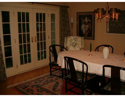 Dining Room. HUGE DINING ROOM WITH FRENCH DOORS LEADING TO BACK DECKS IS PERFECT FOR ENTERTAINING