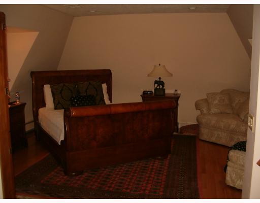Master Bedroom. 3RD FLOOR MASTER SUITE W/ HIGH CEILINGS, PERFECT HARDWOOD FLOORS, DRESSING AREA, LARGE CLOSET, AND MASTER BATH IS YOUR PRIVATE OASIS.
