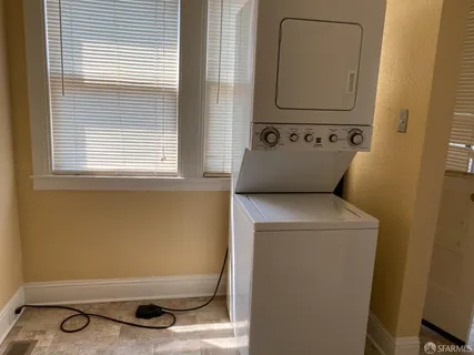 a bathroom with a sink and a window