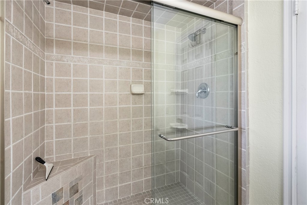 4669 Edgewood Place Riverside, CA 92506 - Photo 14 of 26 a bathroom with a shower